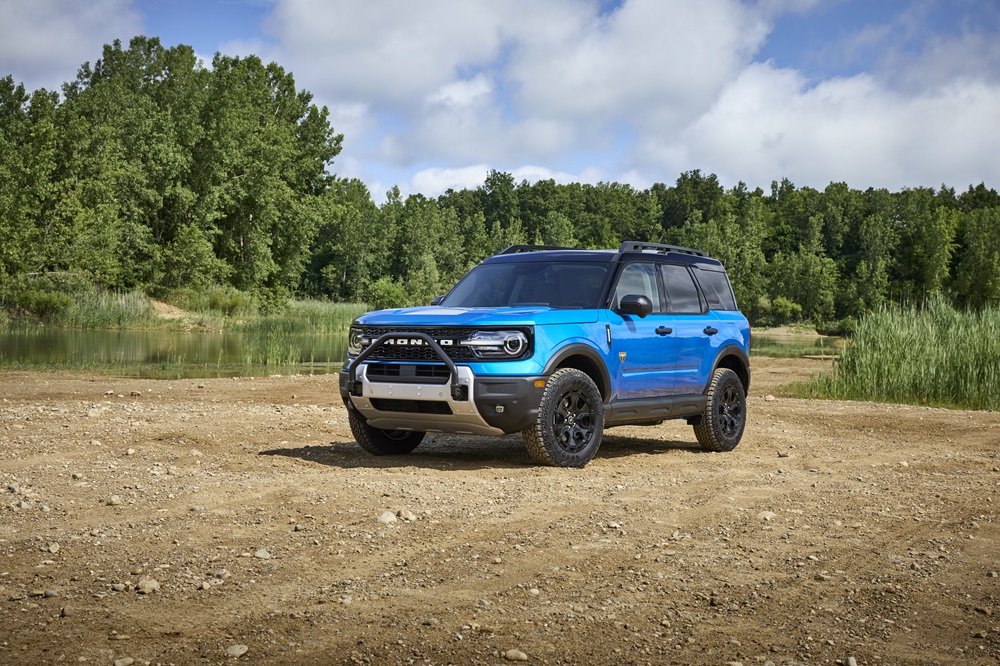 A blue 2025 Ford Bronco Sport sitting on a riverbed