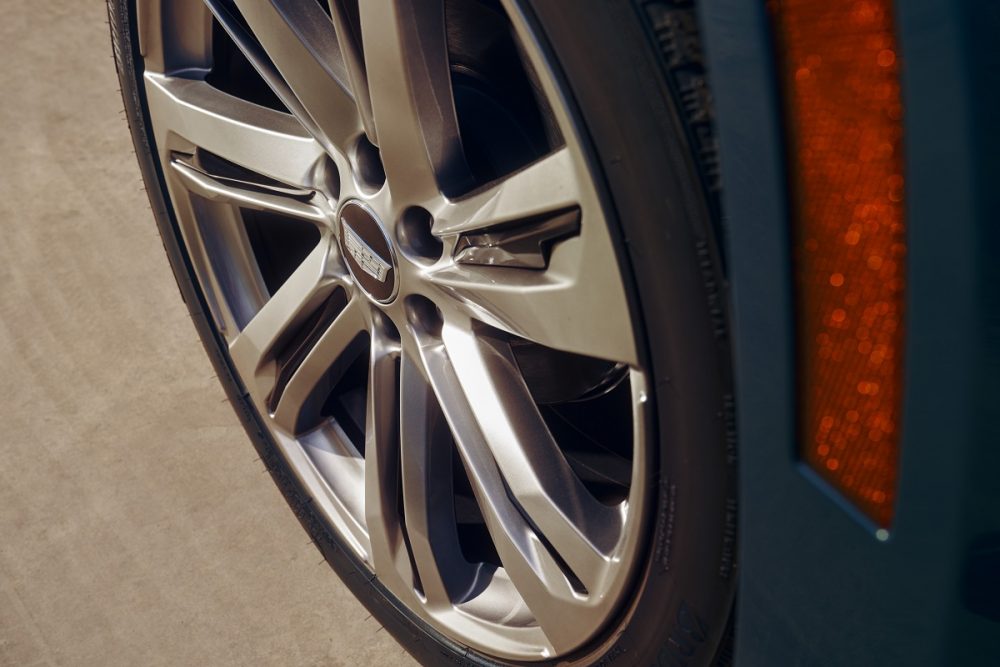 Close-up of the wheel and tire of the 2025 Cadillac Escalade Sport Platinum.