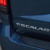 Escalade nameplate on rear of the 2025 Cadillac Escalade Sport Platinum in Deep Sea Metallic.