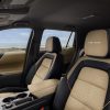 View of Maple Sugar and Black front seats and center console in the 2025 Chevrolet Equinox ACTIV