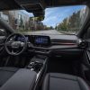 A view of the steering wheel, dashboard, display screens, center console and front seats inside the 2025 Chevrolet Equinox RS