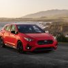 Front 3/4 view of a red 2024 Subaru Impreza RS