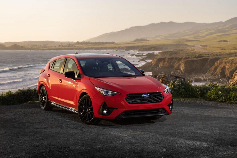 Front 3/4 view of a red 2024 Subaru Impreza RS