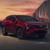 Front 3/4 view of the 2025 Cadillac XT4 Premium Luxury in Radiant Red.