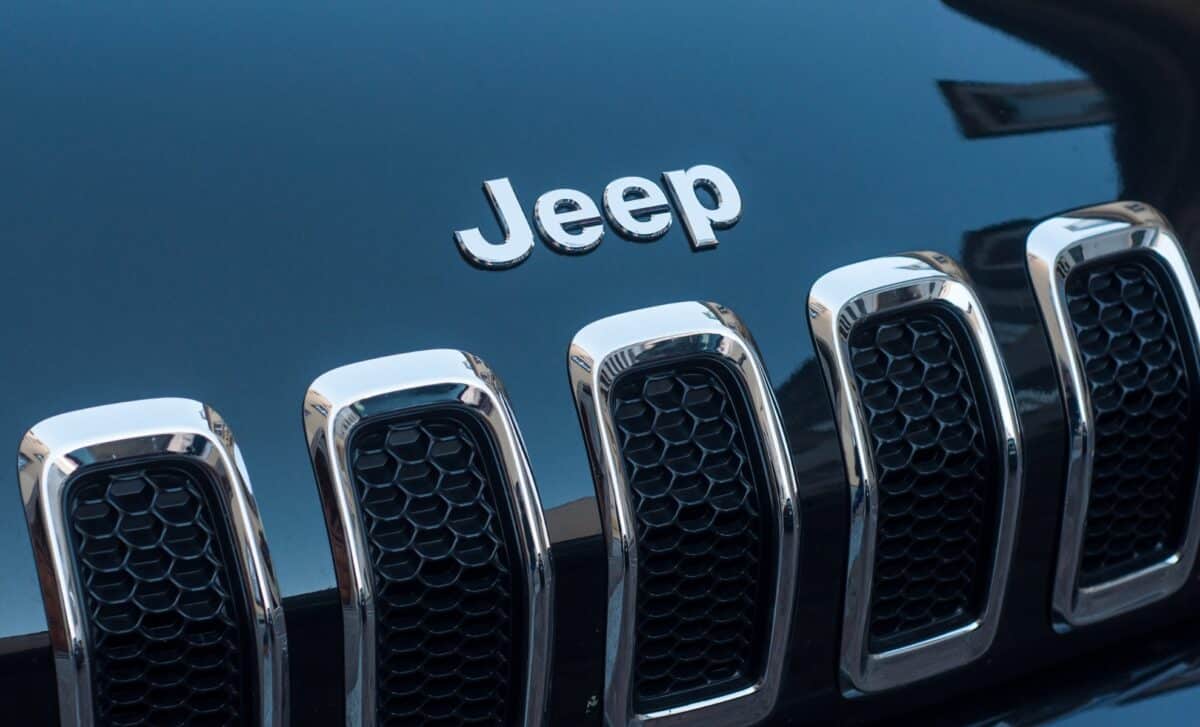 Closeup of Jeep logo on black car front