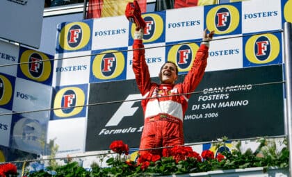 F1 World Championship. Grand Prix of San Marino. Michael Schumacher, Germany, Ferrari, winner, celebrating on the podium with Fernando Alonso and Juan-Pablo Montoya
