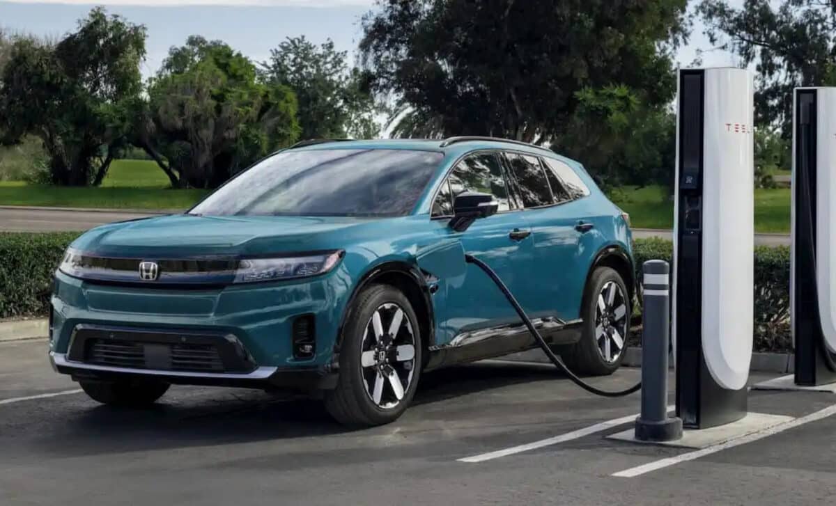Honda Prologue charging on a Tesla electric car charging station