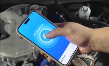 diagnosing an engine problem by simply letting his phone listen to it