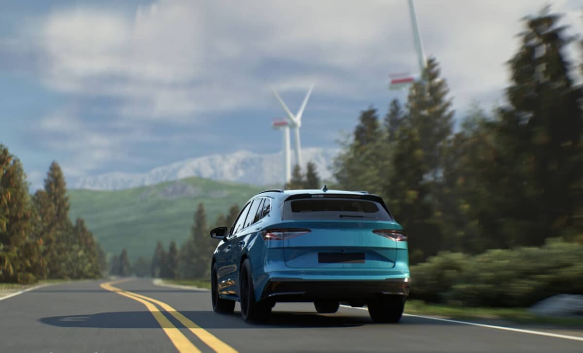 An EV is traveling on a road