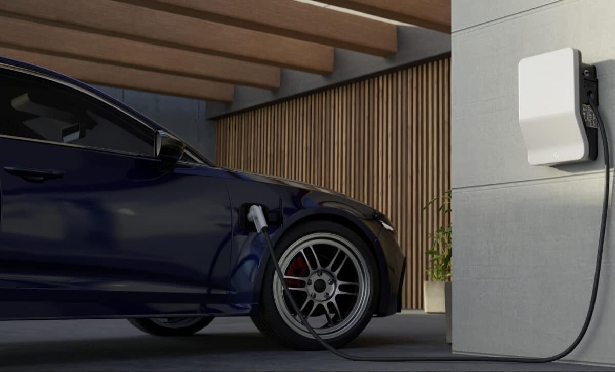 Electric car plugged into a charging station